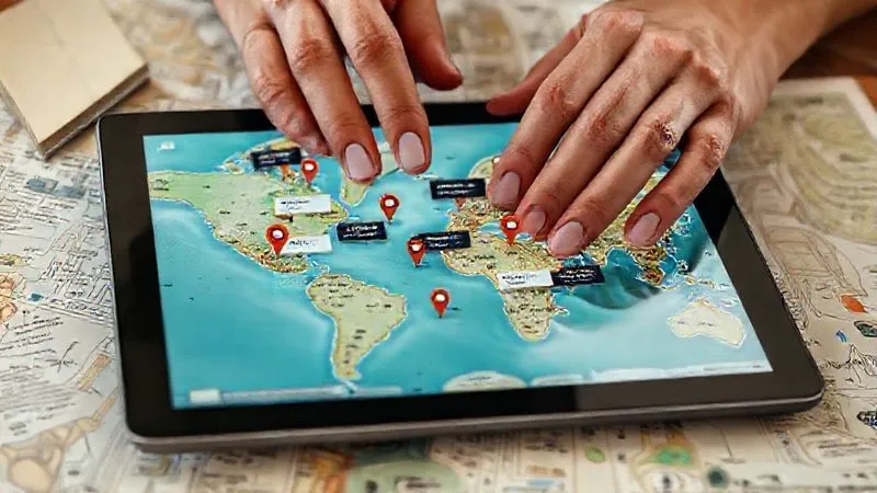 A photorealistic image of a meticulously organized digital map interface on a high-resolution tablet, showing various pinpoints representing unique, off-the-beaten-path locations with detailed pop-up information cards. Hands are gently interacting with the screen, suggesting careful curation. Soft, ambient lighting, sharp focus on the tablet, depth of field blurring a subtle background of travel notes, 8K hyper-detailed.