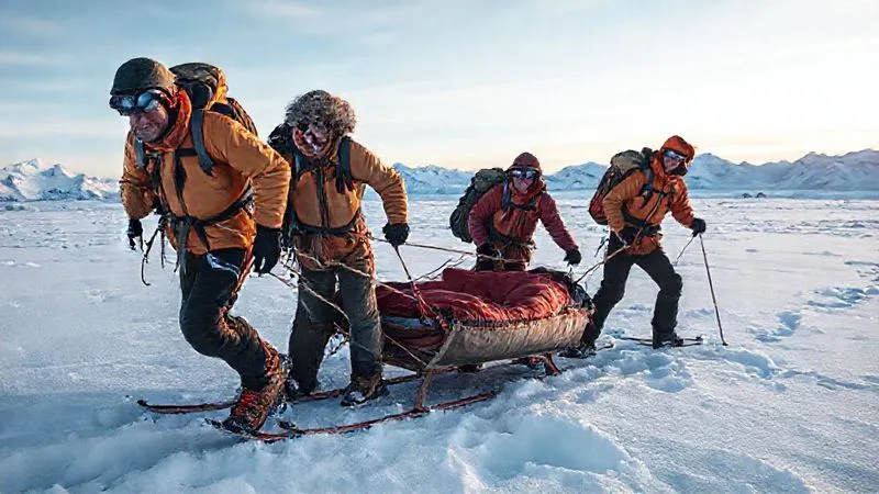 A photorealistic, professional photography, 8K, cinematic lighting, sharp focus, depth of field, shot on a high-end DSLR image of a team of climbers carefully pulling an improvised sled (made from a sleeping pad and skis) across a snow-covered glacier. The climbers are roped together, and their faces show determination and effort. Distant mountains loom under a clear, cold sky. A photorealistic, professional photography, 8K, cinematic lighting, sharp focus, depth of field, shot on a high-end DSLR image of a team of climbers carefully pulling an improvised sled (made from a sleeping pad and skis) across a snow-covered glacier. The climbers are roped together, and their faces show determination and effort. Distant mountains loom under a clear, cold sky.